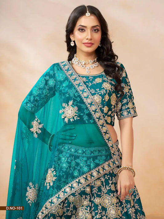 Teal blue art silk lehenga choli showing embroidered blouse detailing
