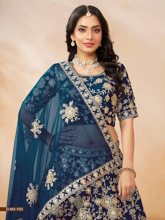 Half view of navy blue art silk lehenga choli showing embroidered blouse detailing