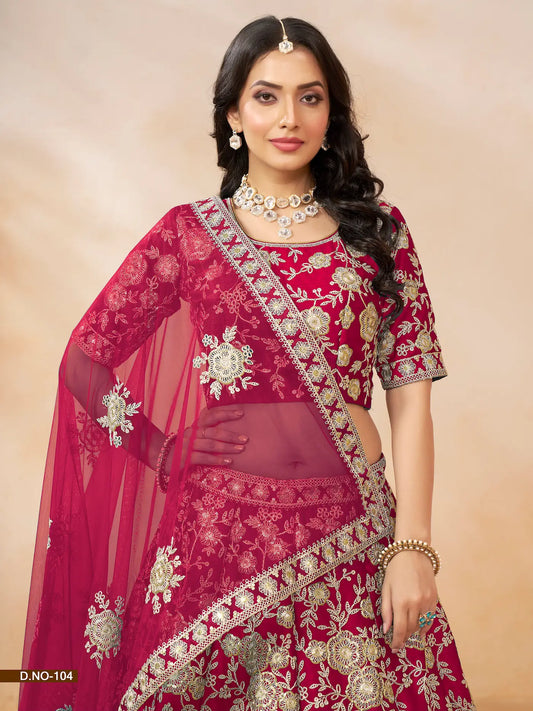Half view of red art silk lehenga choli showing embroidered blouse detailing