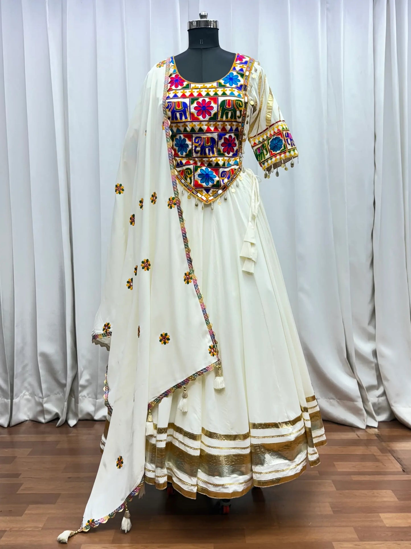 White Navratri Lehenga With Kutchi Work And Mirror Kodi Work Trendy Blouse