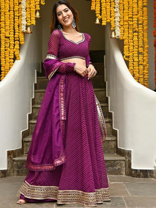 Wine colored Georgette Leheriya Print Lehenga With Zari And Cording Lace Work
