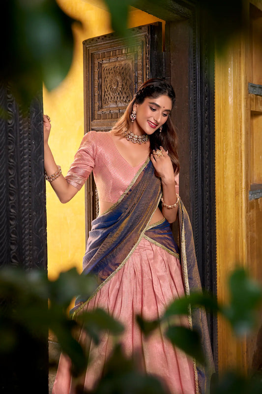 Half view of light pink dhupian silk lehenga choli showing zari weaving work