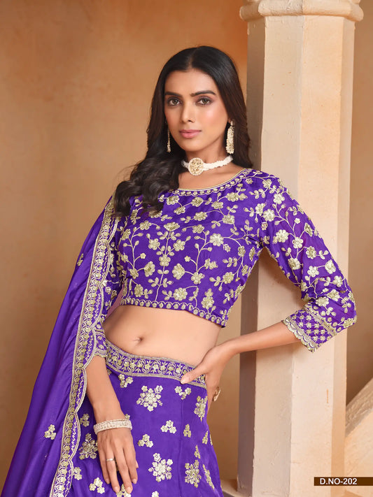 Half view of purple organza lehenga choli showing embroidered blouse detailing