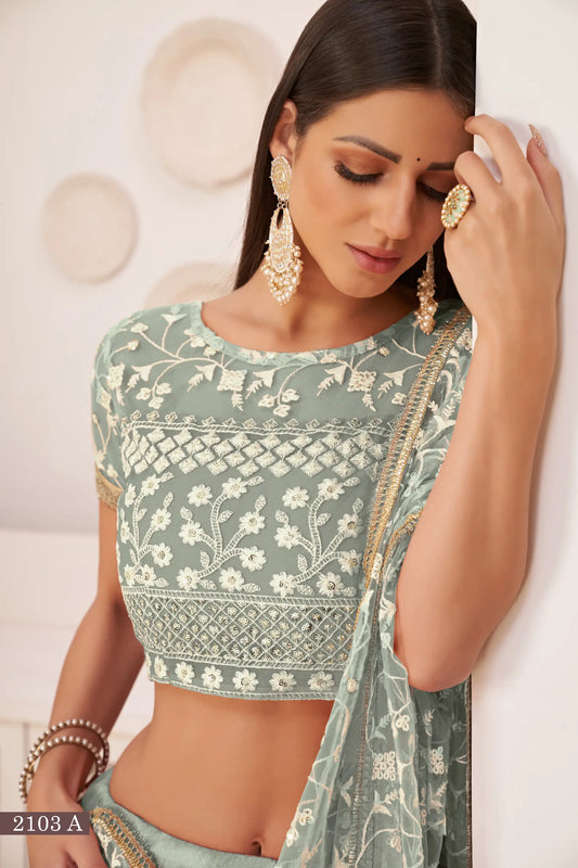 Turquoise Green Net Lehenga Choli With White Cotton Thread Work, Zari Work & Sequence Work