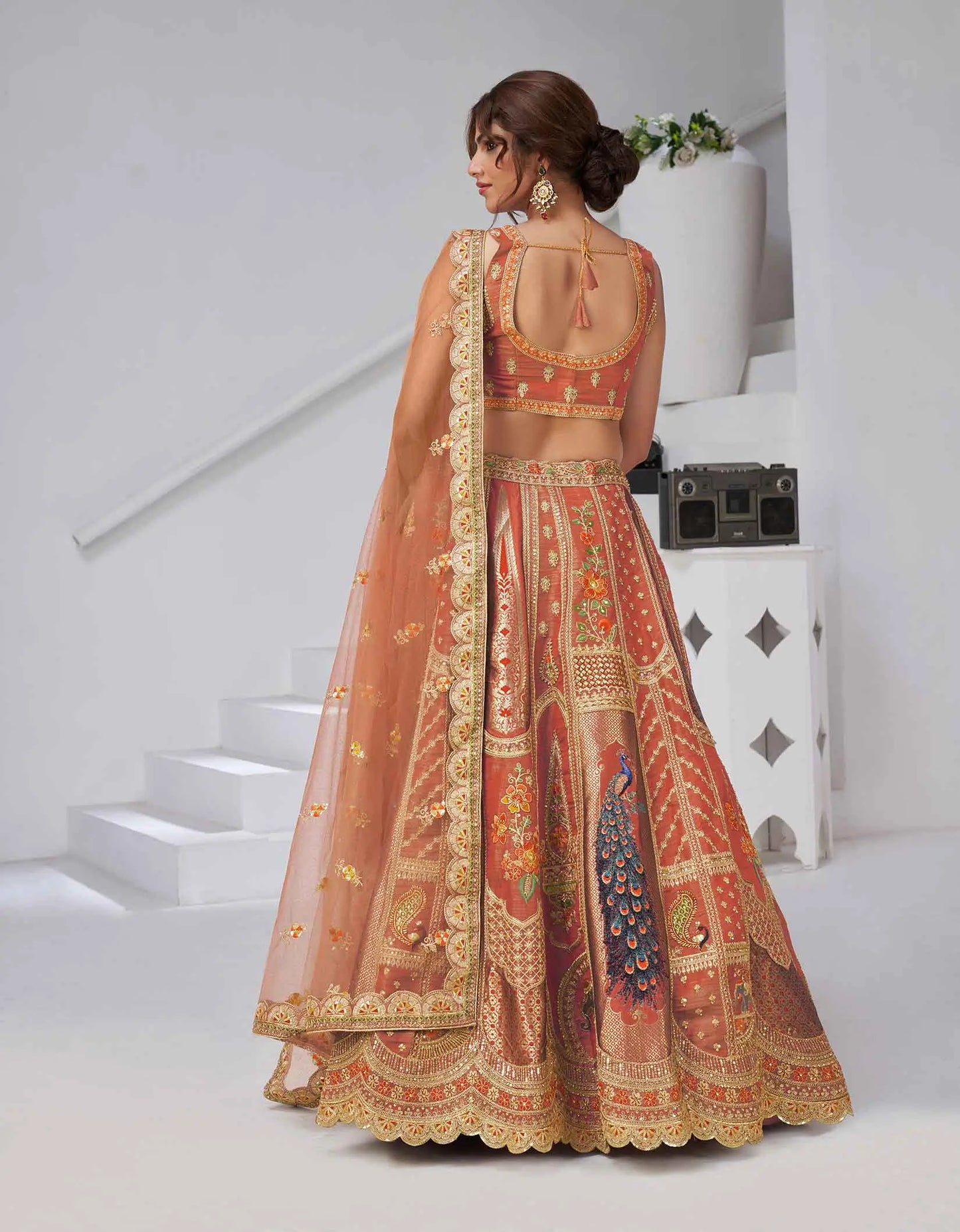 Elegant Rust Silk Lehenga With Feather Detailing