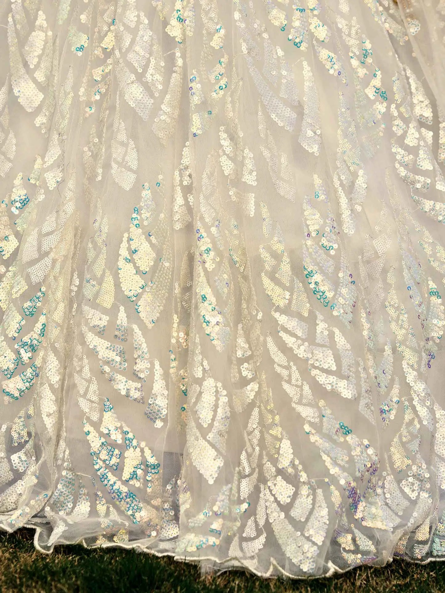 White Soft Net Lehenga With Multiple Sequins And Thread Embroidery Work