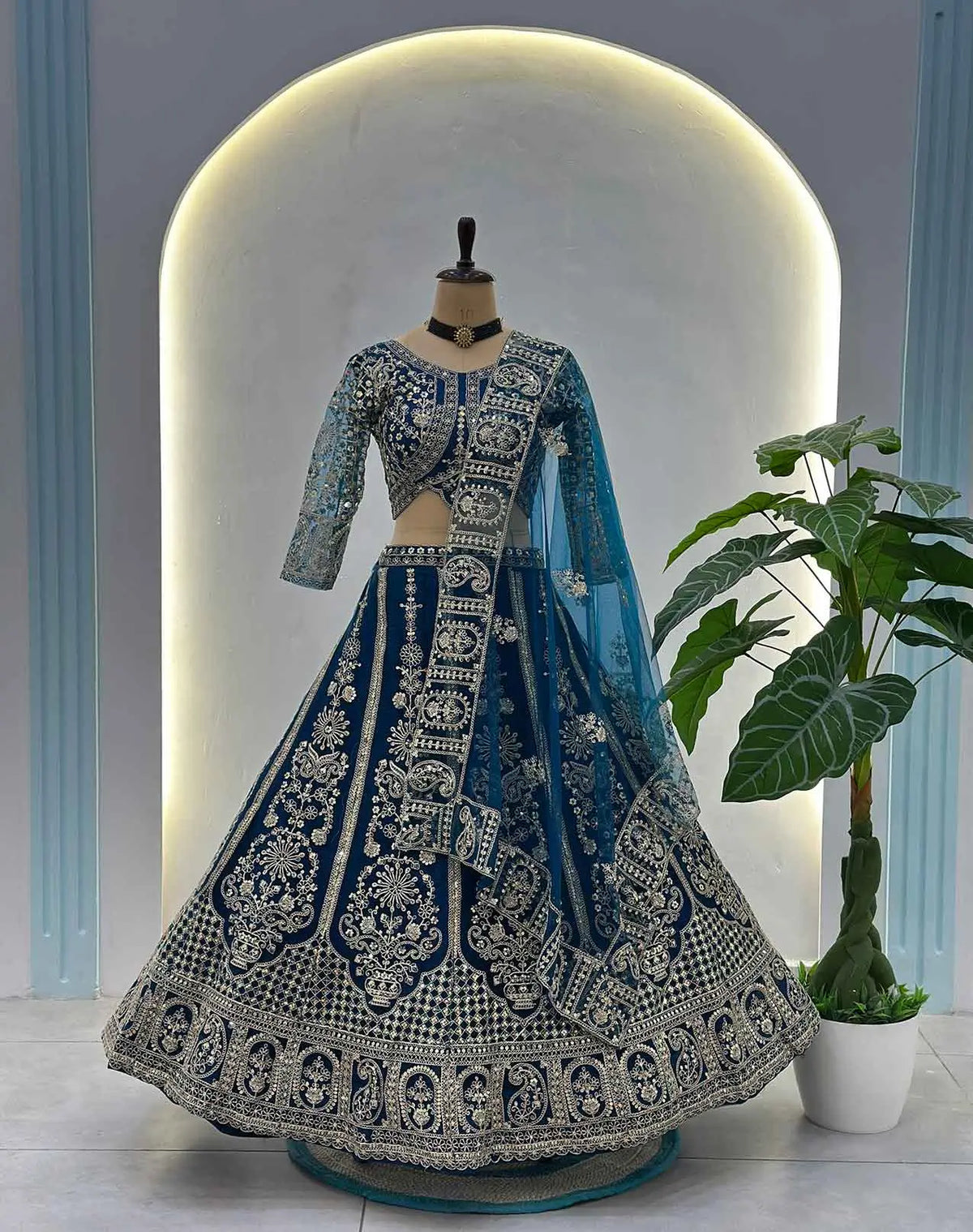 Teal Blue Embroidered Net Lehenga Choli