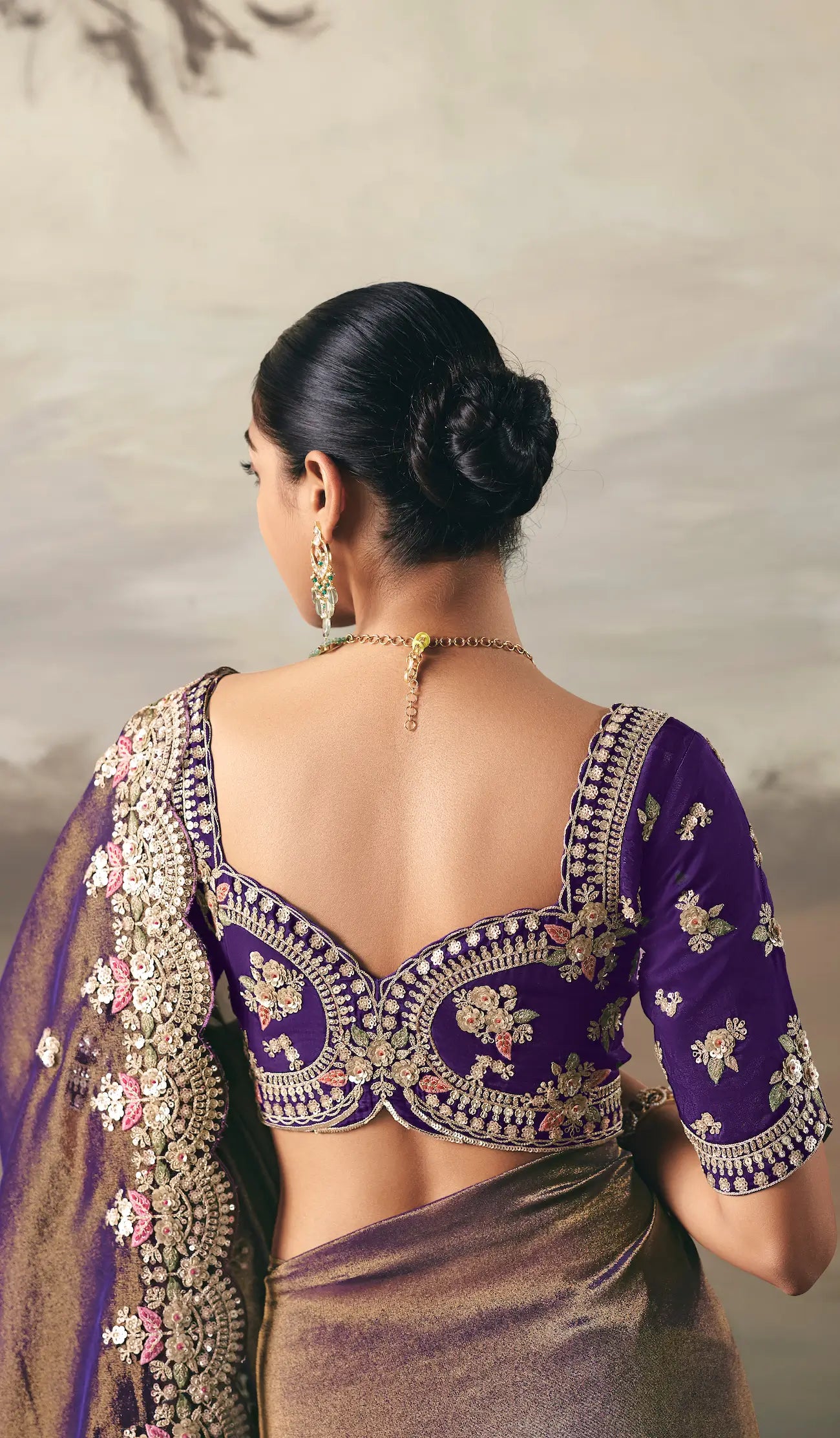 Golden Purple Heavy Embroidered Tissue Silk Saree