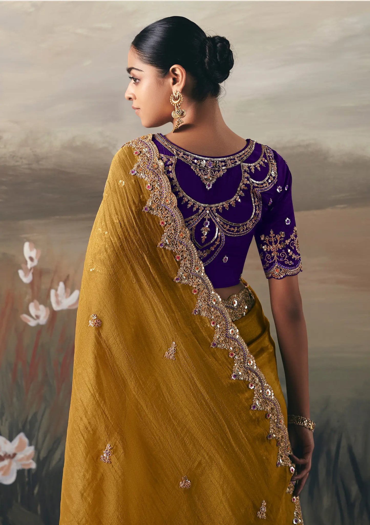 Turmeric Yellow Heavy Embroidered Tissue Silk Saree