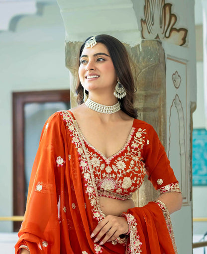Rust Embroidered Georgette Lehenga Choli
