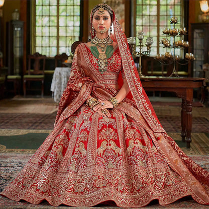 Red Bridal Lehenga Featuring Rich Embroidery & Pearl