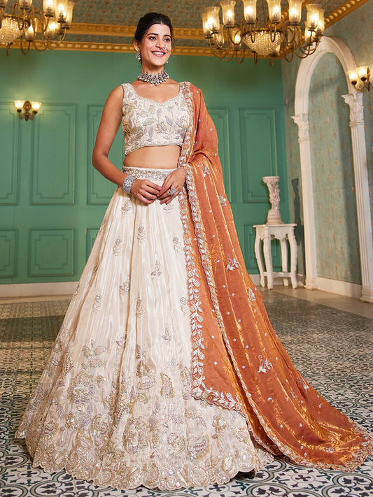 Off White Rust Viscose Lehenga Choli With Motifs & Rich Embroidery