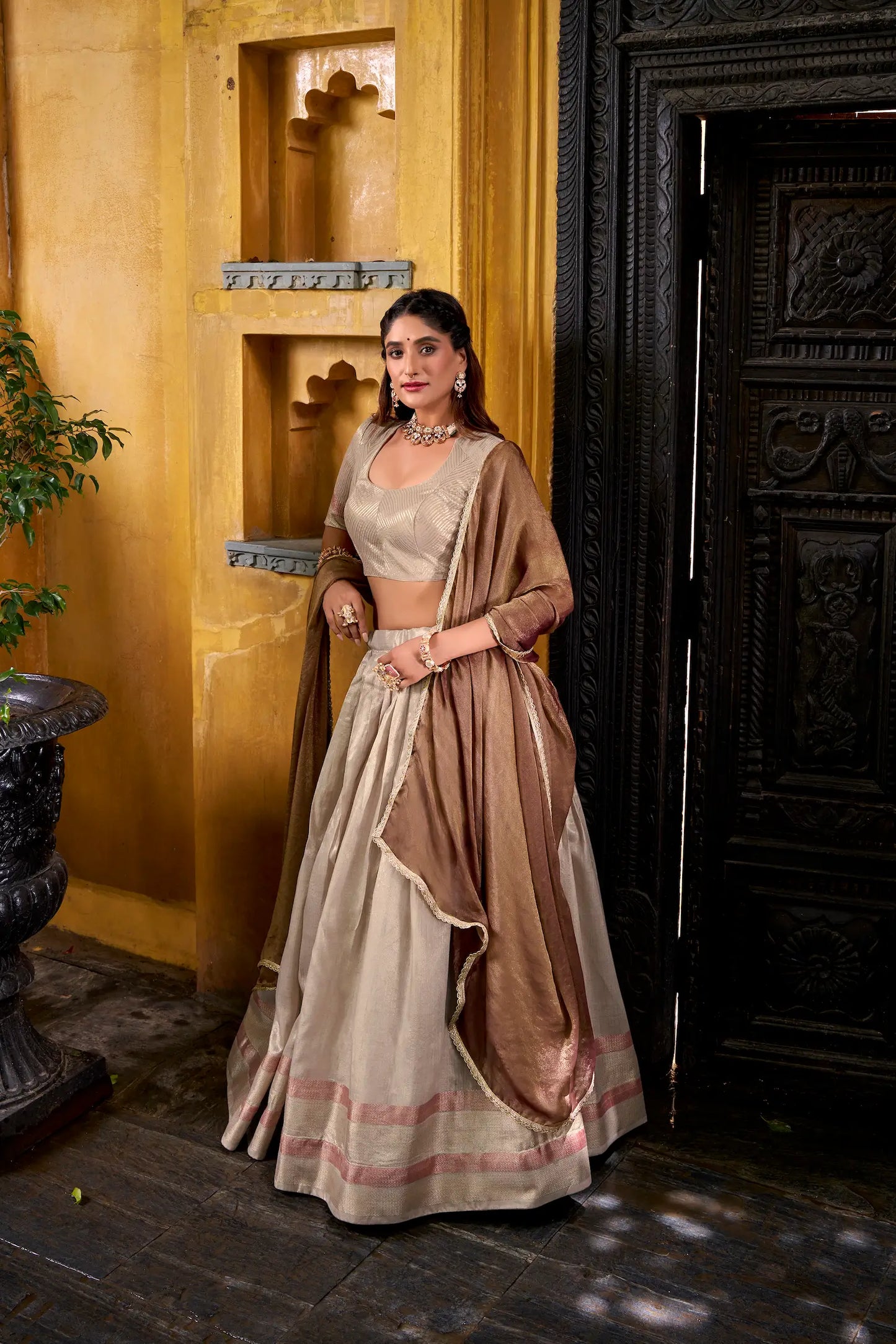 Side view of sand beige dhupian silk lehenga choli showing detailed weaving