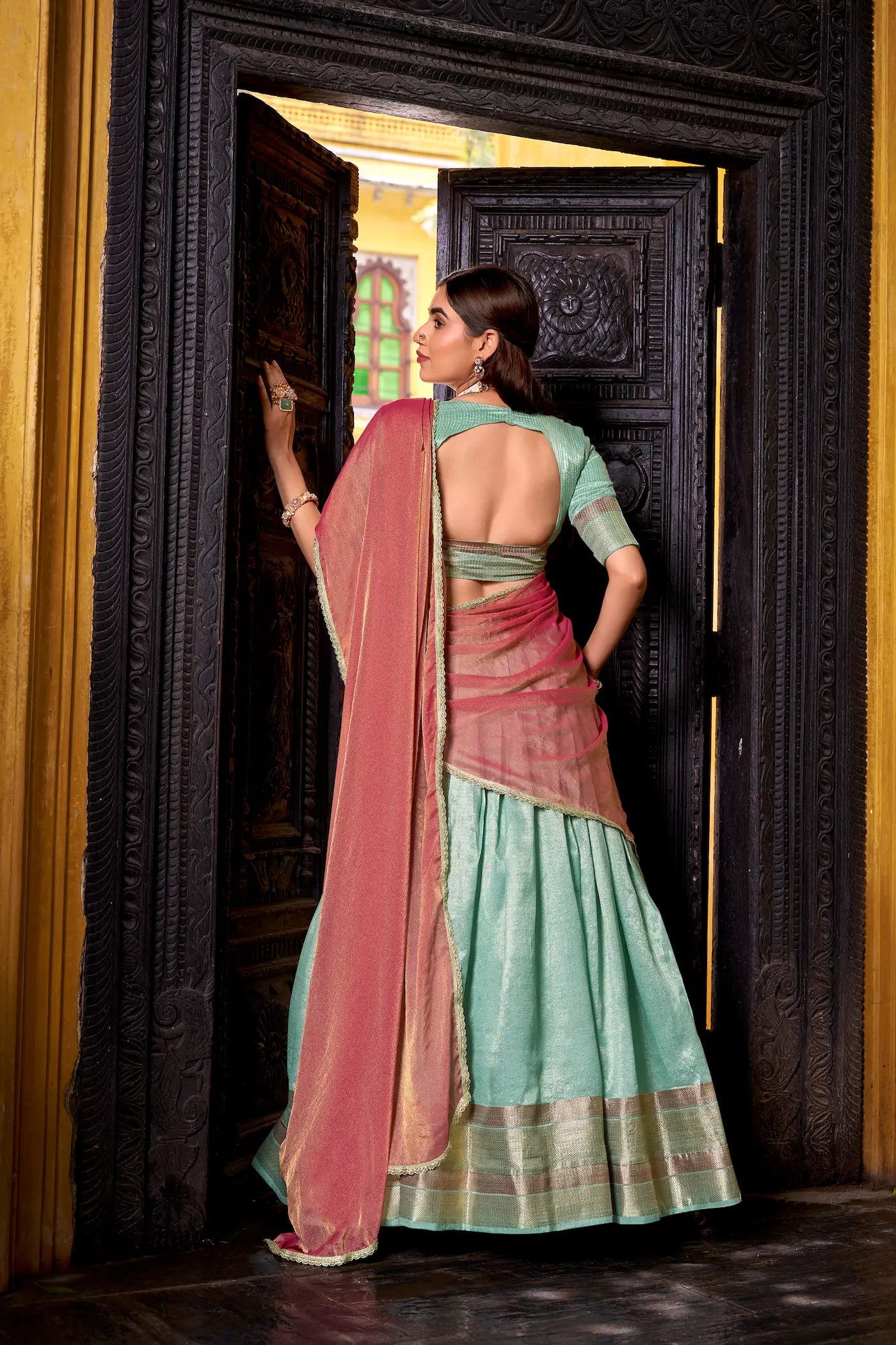 Back view of sea blue dhupian silk zari weaving lehenga choli full look