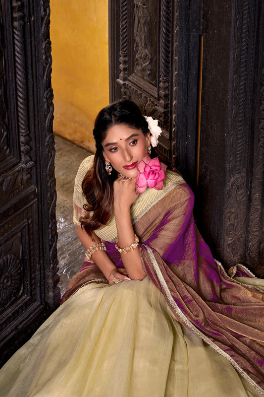 Half view of tan yellow dhupian silk lehenga choli showing zari weaving work