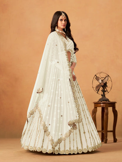 Side view of off white art silk paper mirror and embroidery lehenga choli with dupatta