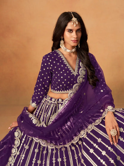 Close-up of purple art silk lehenga choli showing paper mirror and embroidery blouse detailing