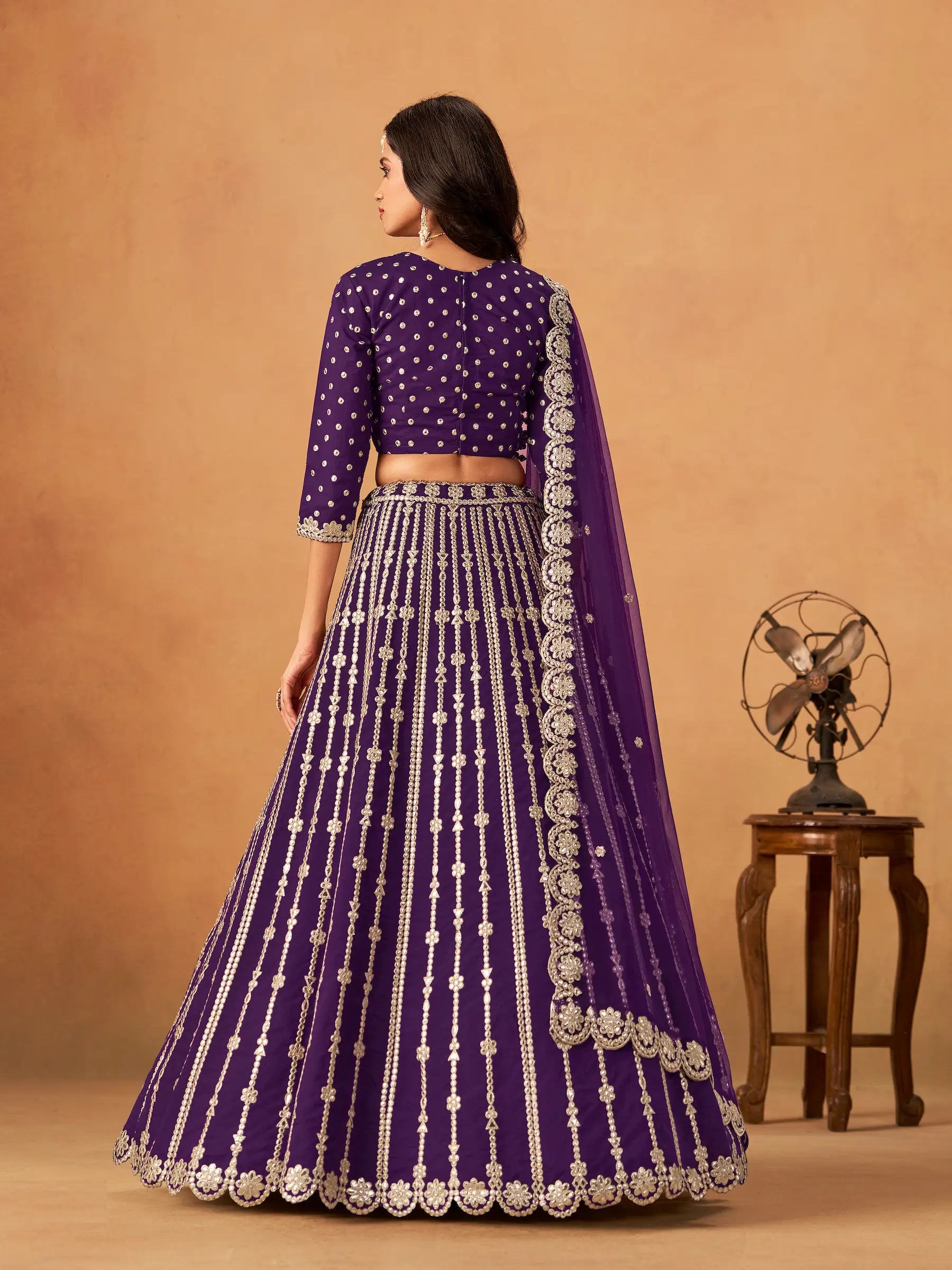Back view of purple art silk paper mirror and embroidery lehenga choli full look