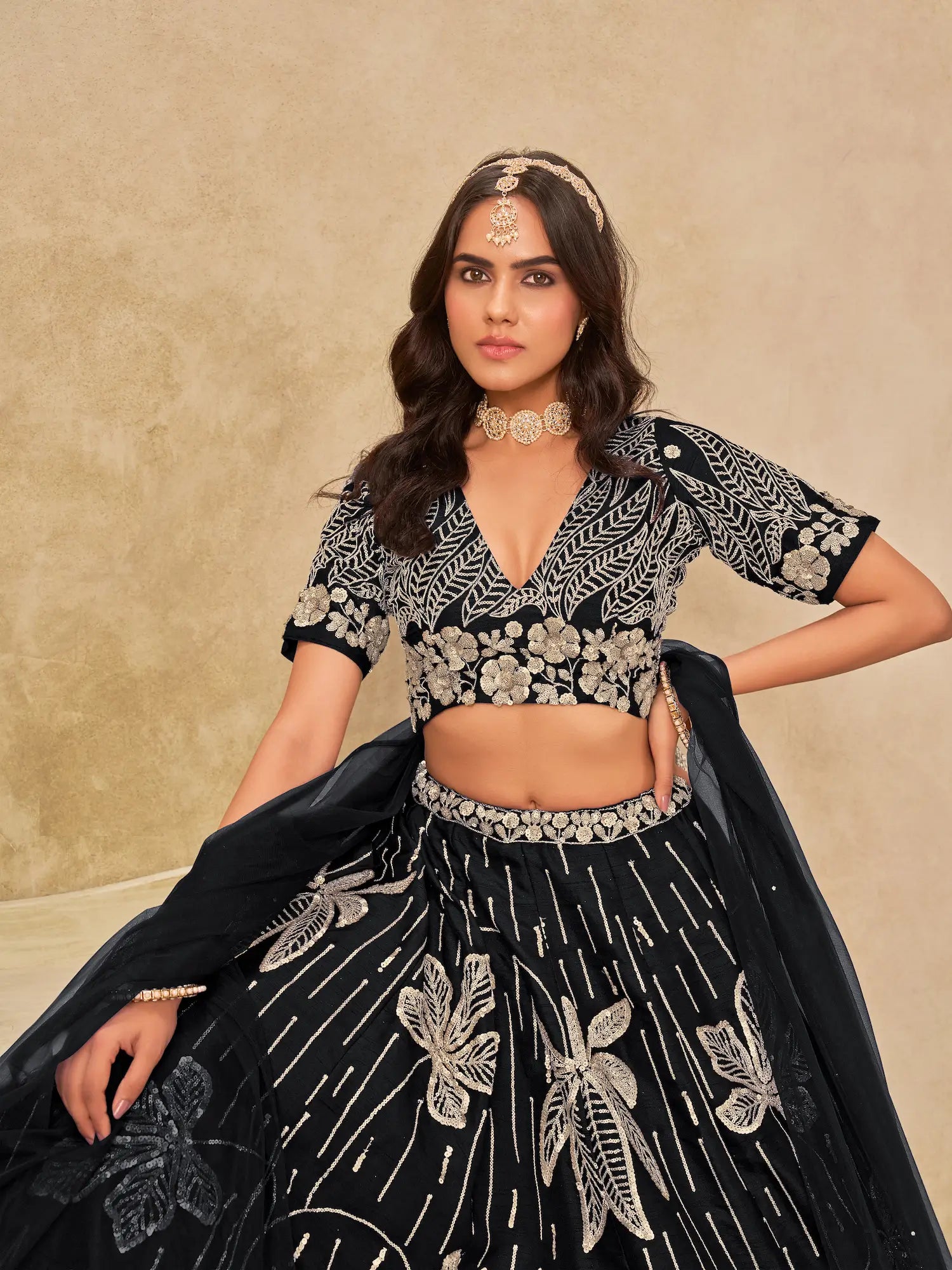 Close-up of black art silk lehenga choli showing sequins embroidery blouse detailing