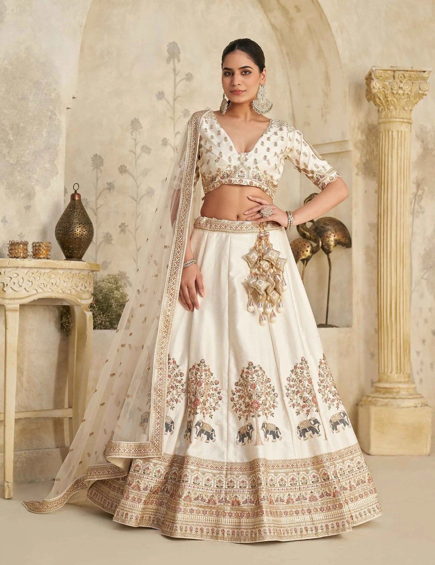Cream Lehenga With Intricate Elephant Zari Work