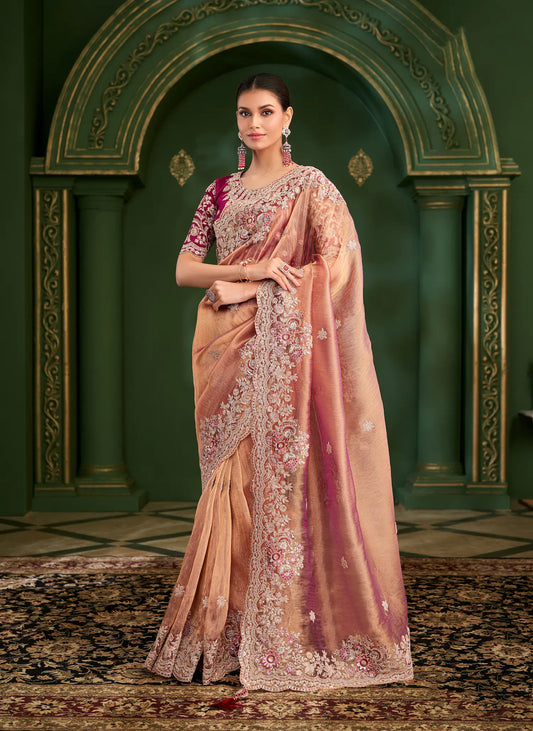 Peachy Orange Shiny georgette Heavy Embroidery Saree