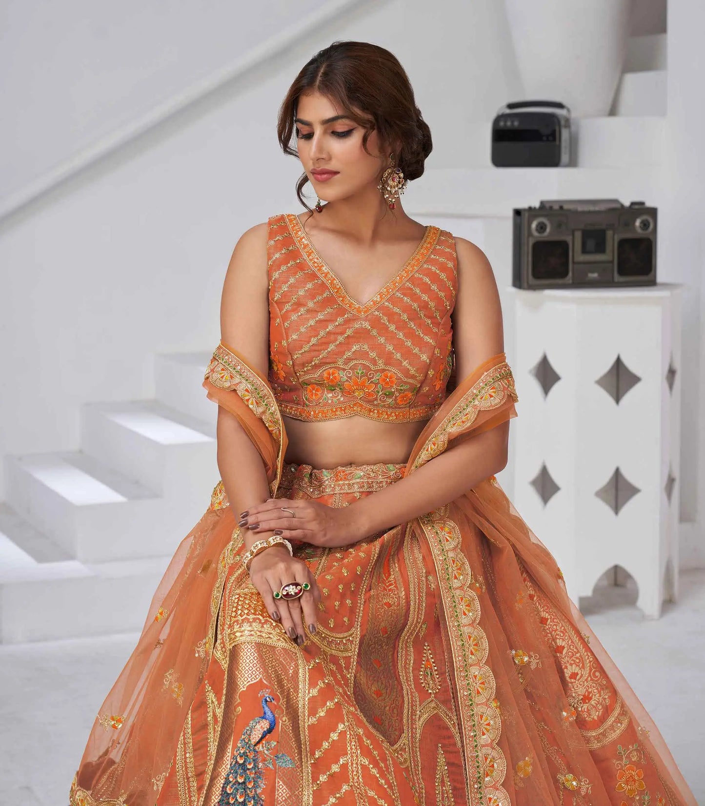 Elegant Rust Silk Lehenga With Feather Detailing