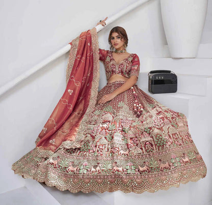 Pinkish Red Bridal Lehenga With Temple & Cow Motifs
