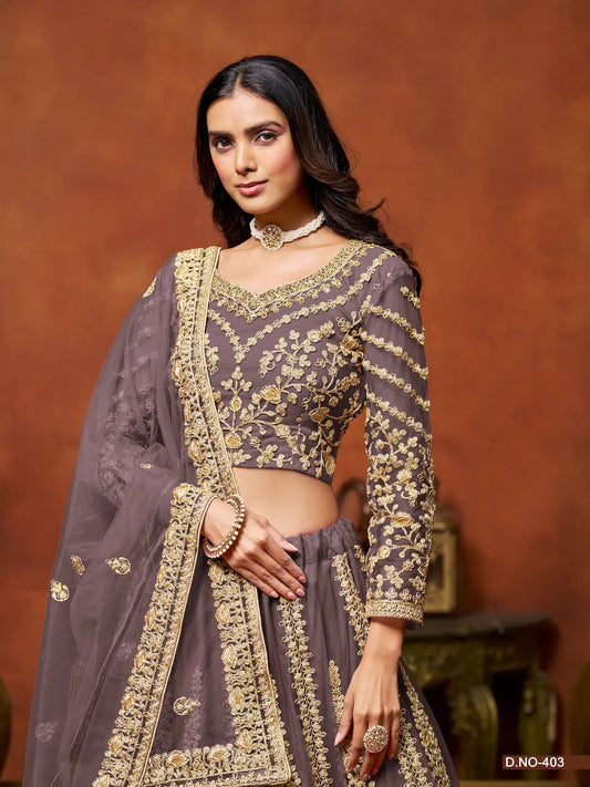 Half view of dusty grey net lehenga choli showing embroidered blouse detailing