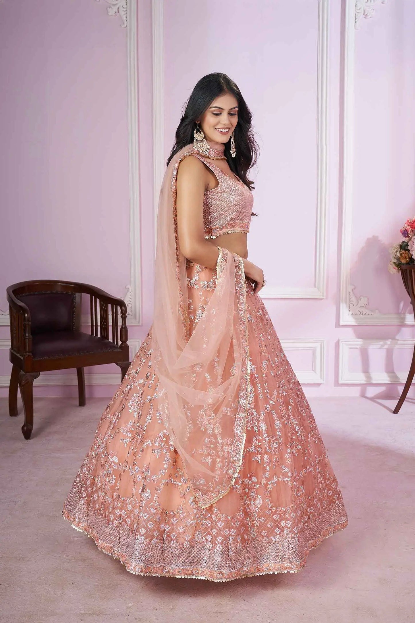 Peach Soft Net Lehenga With Sequins Thread Badla Zari Embroidery Work