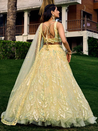 Yellow Soft Net Lehenga With Multiple Sequins And Thread Embroidery Work