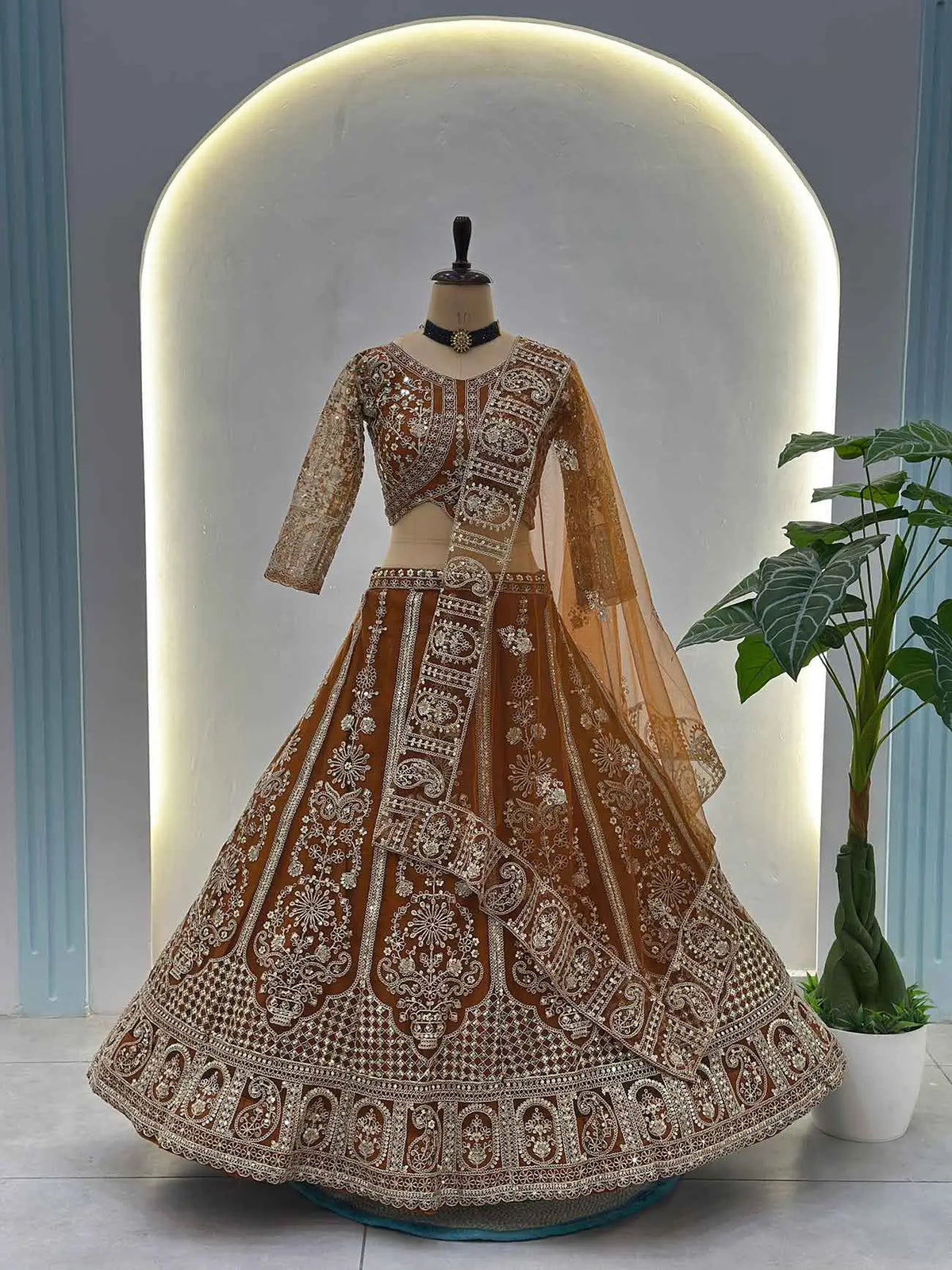 Rust Embroidered Codding Net Lehenga Choli