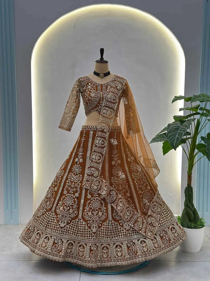 Rust Embroidered Codding Net Lehenga Choli