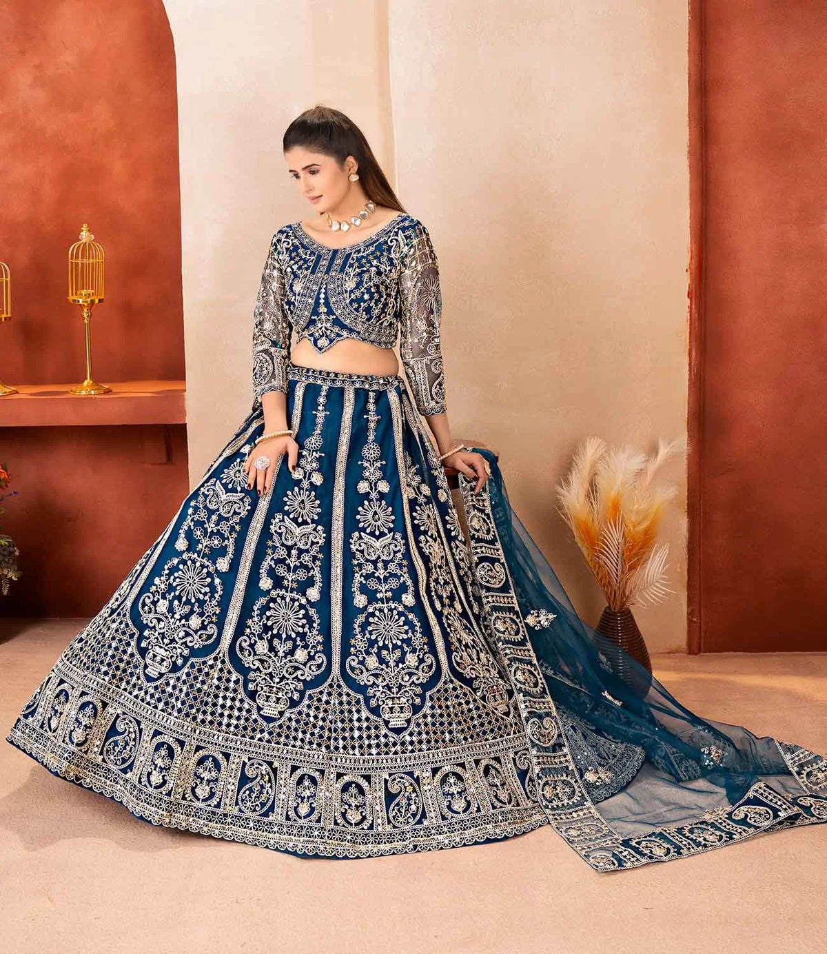 Teal Blue Embroidered Net Lehenga Choli