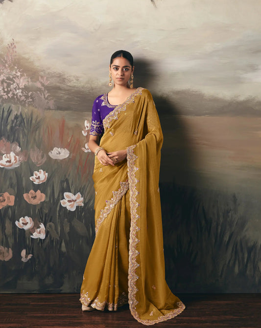 Turmeric Yellow Heavy Embroidered Tissue Silk Saree