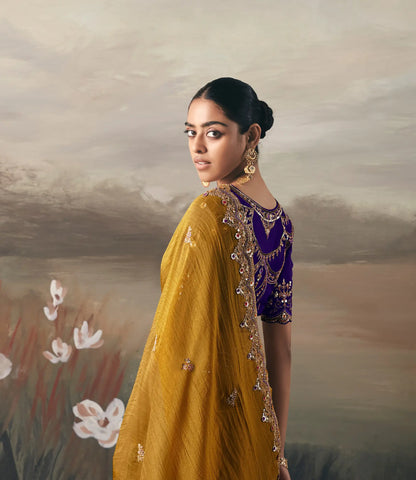 Turmeric Yellow Heavy Embroidered Tissue Silk Saree