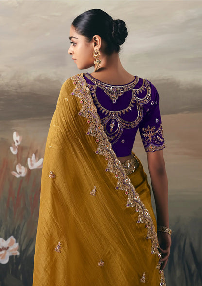 Turmeric Yellow Heavy Embroidered Tissue Silk Saree