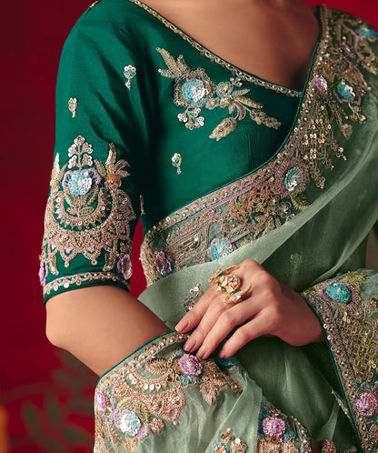 Pista Green Heavy Embroidered Saree