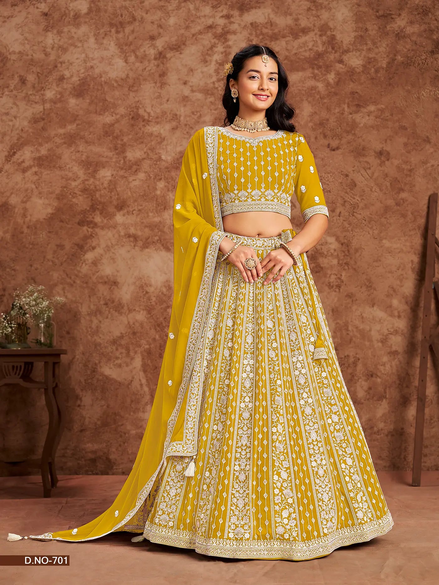 Yellow Designer Faux Georgette Lehenga Choli With Thread And Sequins Work