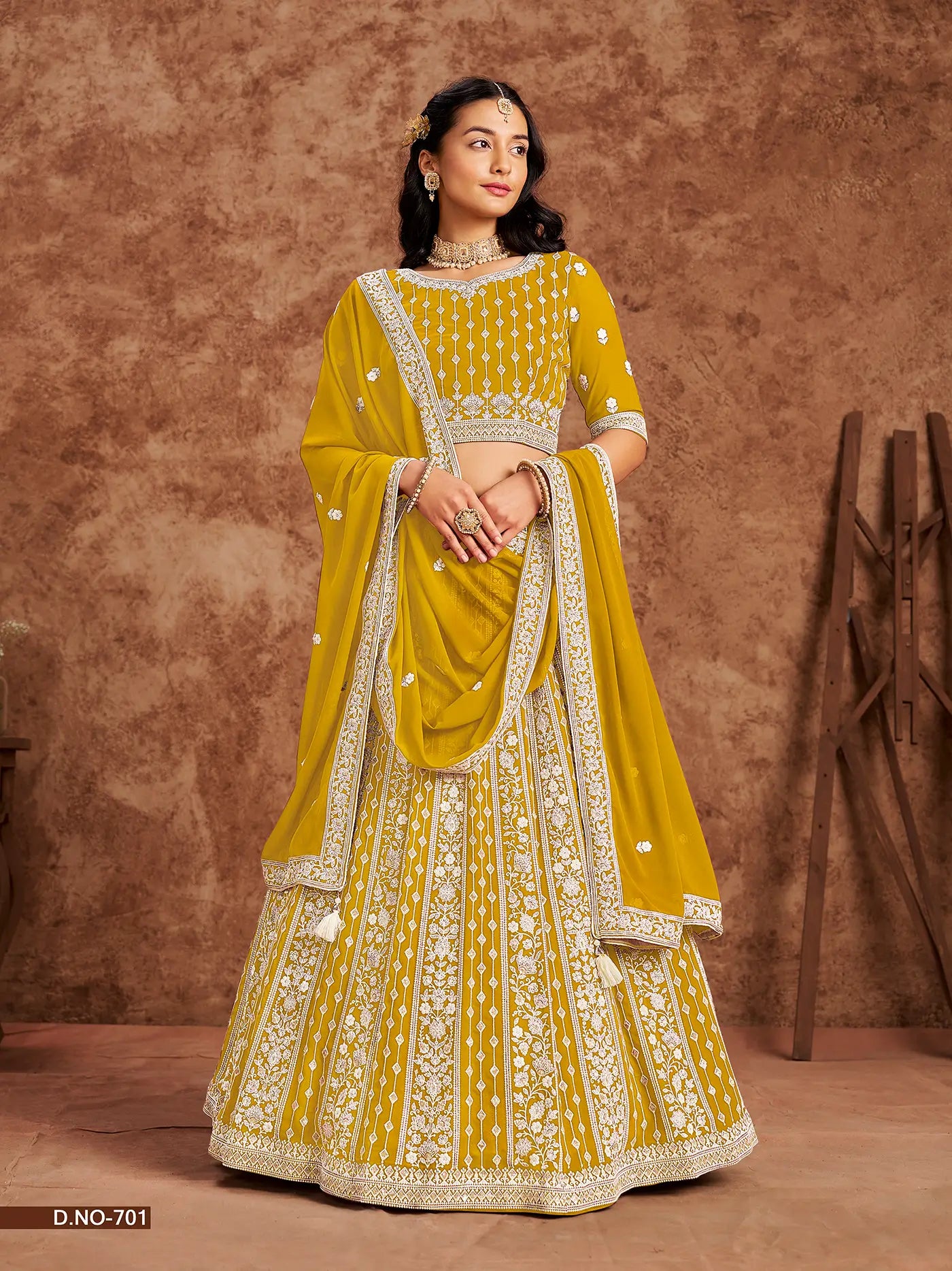 Yellow Designer Faux Georgette Lehenga Choli With Thread And Sequins Work