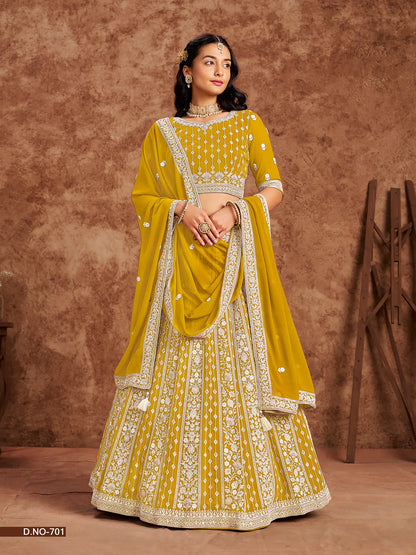 Yellow Designer Faux Georgette Lehenga Choli With Thread And Sequins Work