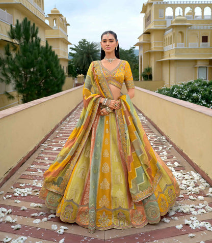Pastel yellow designer embroidery work lehenga full view with dupatta