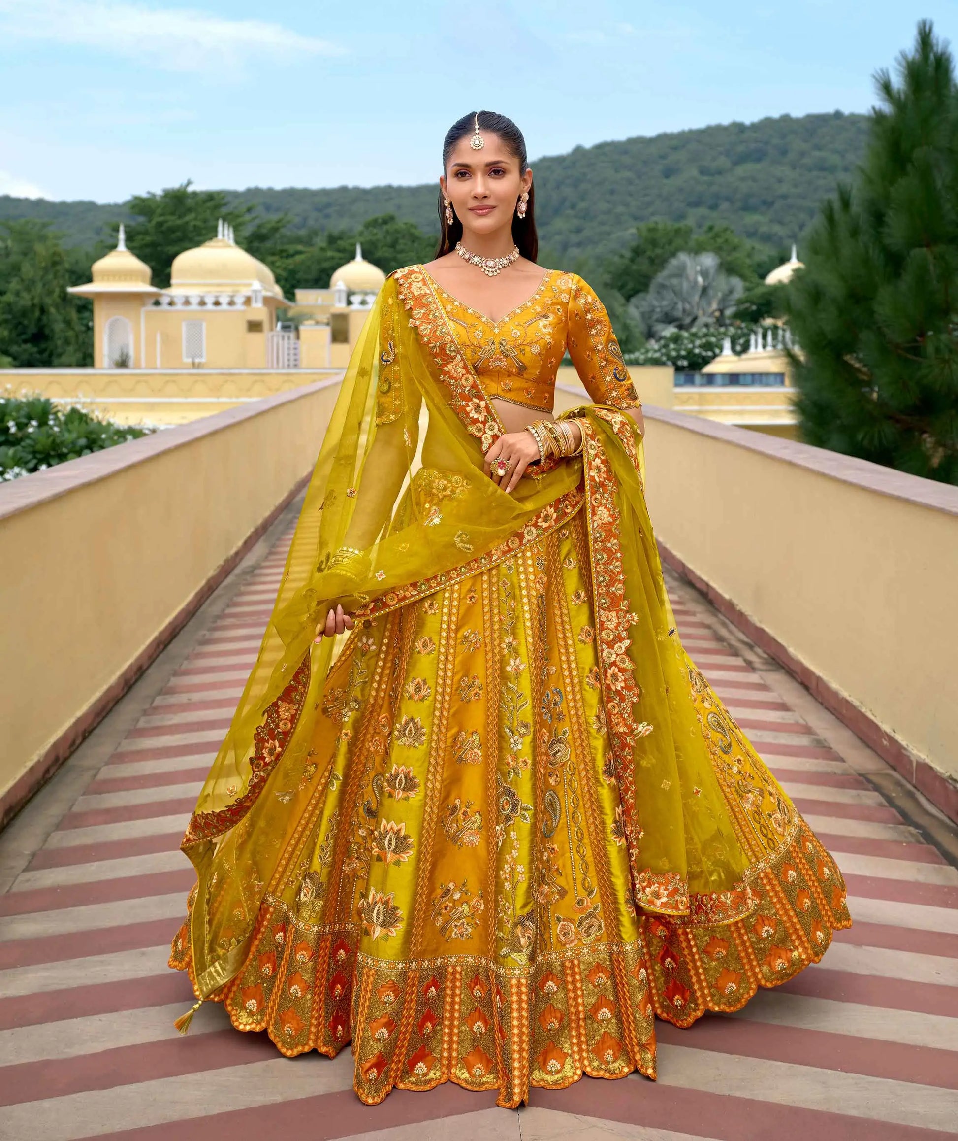 Golden lehenga with heavy embroidery, sequins and lotus work full view