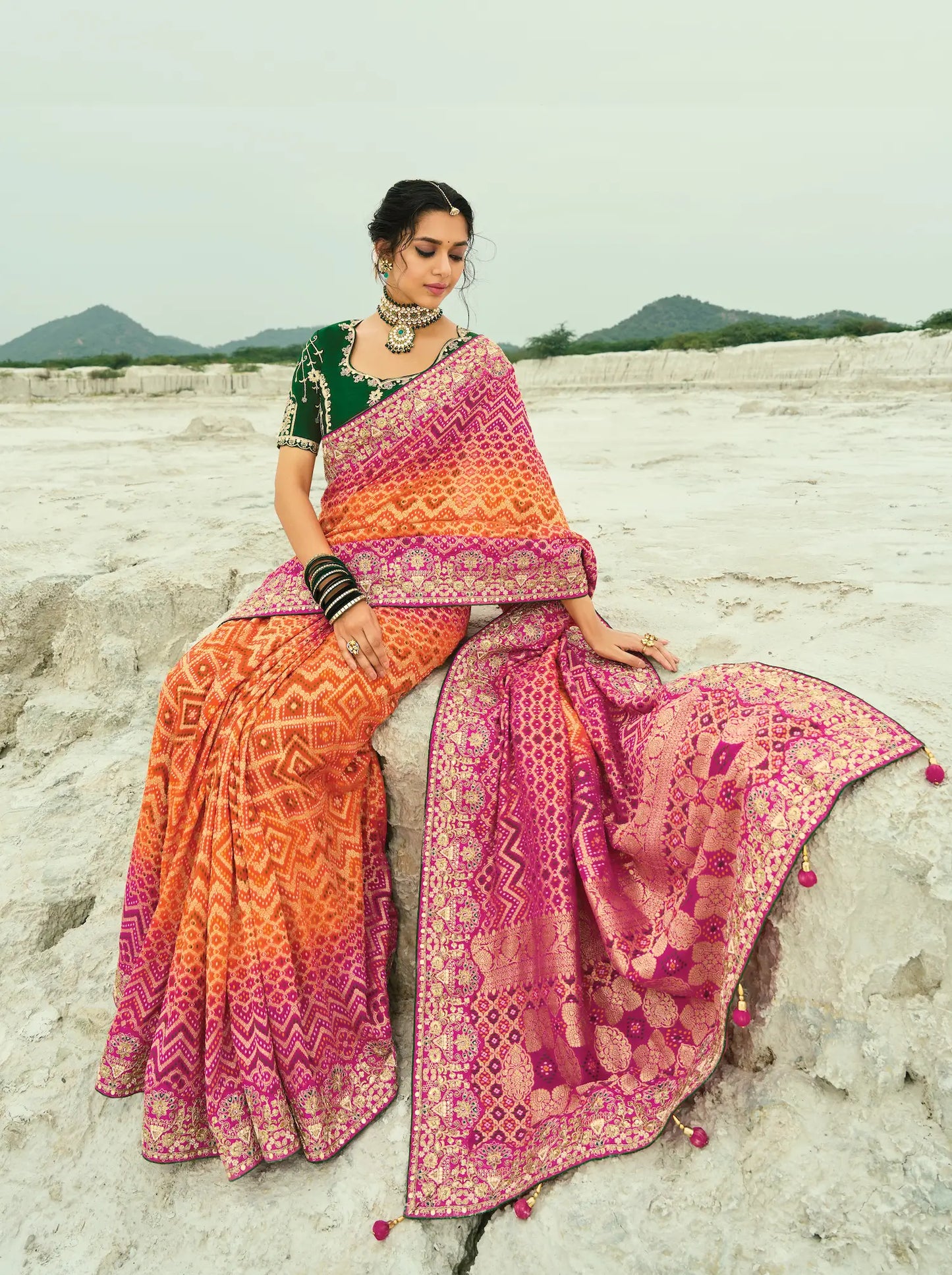 Orange-Rani pink Georgette Heavy Embroidered Bandhej Saree