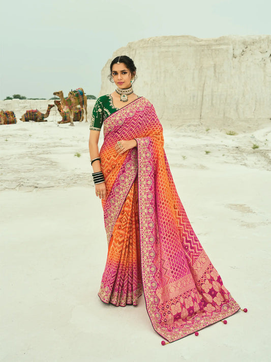 Orange-Rani pink Georgette Heavy Embroidered Bandhej Saree