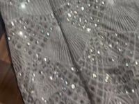 Off White Net Lehenga Embellished With Heavy Sequins And Heavy Dori Work