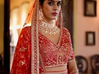 Red Bridal Lehenga With Heavy Embroidery & Pearl Work