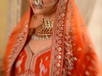 Orange Bridal Lehenga With Heavy Embroidery & Pearl Work