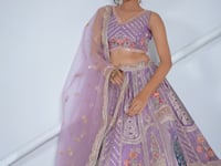Dusky Purple Silk Lehenga With Peacock Feather Motifs