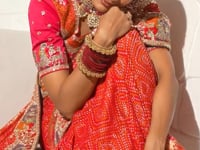 Orangy Red Georgette Heavy Bandhej Saree