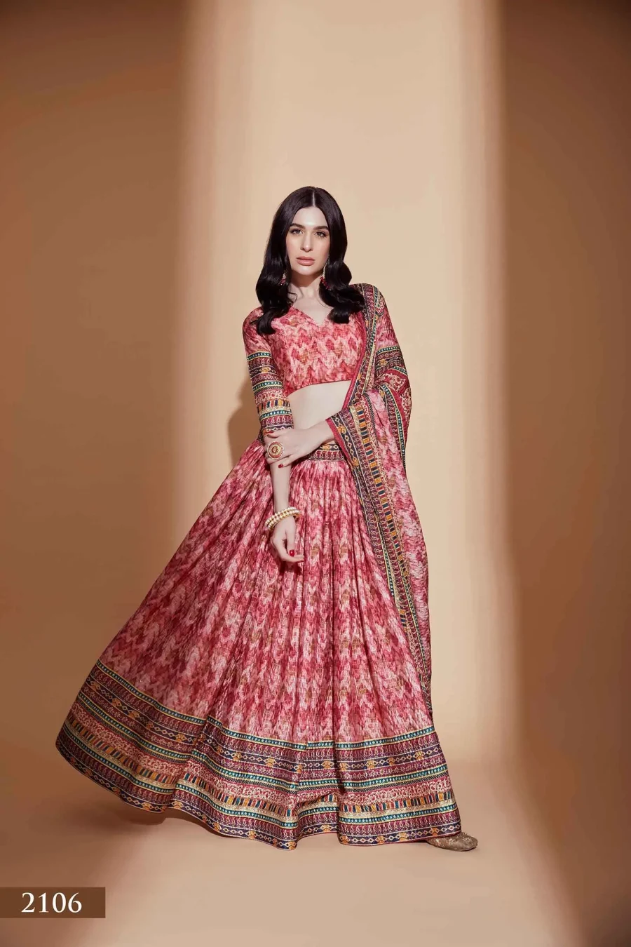 Adds a Touch of Movement and Elegance with Peach Paradise Lehenga Choli